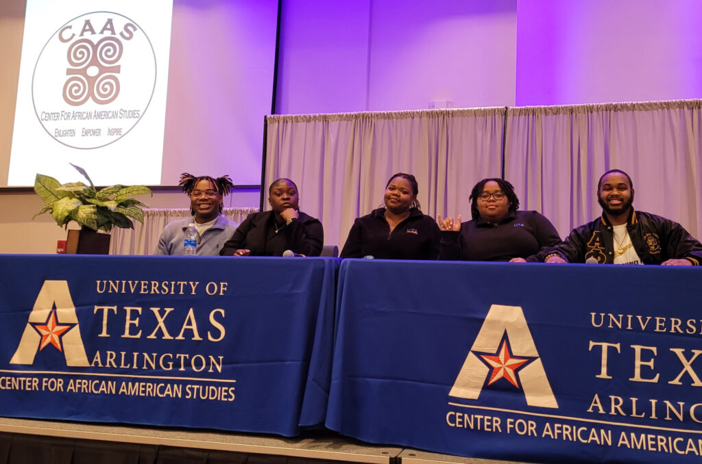 CAAS students sitting on panel